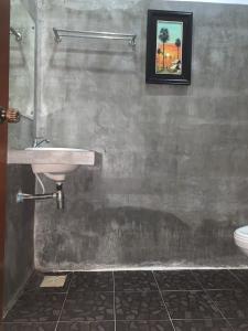 a bathroom with a sink and a toilet at Sakun House in Siem Reap +35 photos