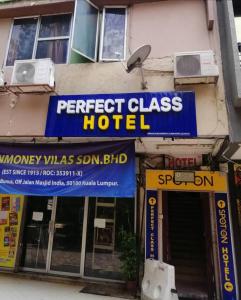 a building with a sign for a secret glass hotel at perfect class hotel in Kuala Lumpur