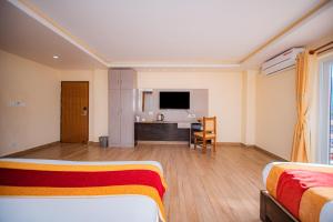 Televisyen dan/atau pusat hiburan di Hotel Murano
