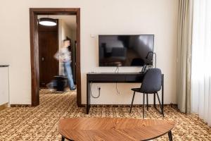 TV a/nebo společenská místnost v ubytování Žilvinas Hotel