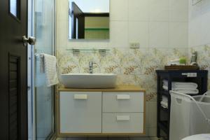A cozinha ou kitchenette de 輕旅小站 Soft Travel Hostel
