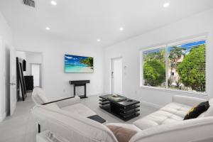 Et tv og/eller underholdning på Villa Coco Cozy Home Near Brickell Miami Beach