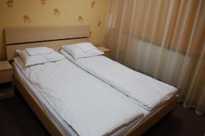 Postel nebo postele na pokoji v ubytování Eurohotel