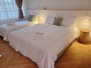 Postel nebo postele na pokoji v ubytování Metime Ipoh Garden