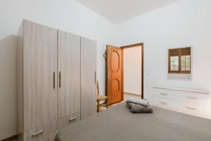 Posteľ alebo postele v izbe v ubytovaní Casa Adriana