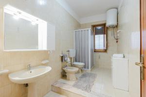Kúpeľňa v ubytovaní Casa Adriana