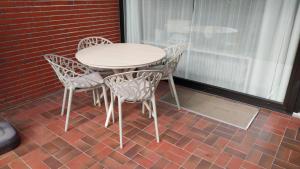 Patio nebo venkovní prostory v ubytování Kleines Mollymook + 1 fotografie