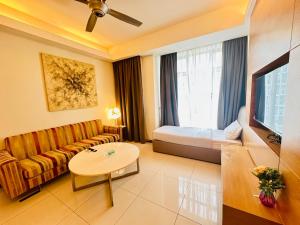 O zonă de relaxare la SOHO SUITES KLCC by DREAMS +16 fotografii