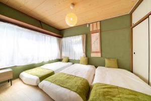 Una cama o camas en una habitación de 広尾駅徒歩2分 渋谷 六本木 表参道エリア 8宿泊可能 一棟貸切
