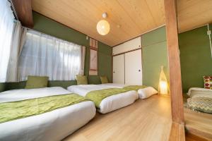 Una cama o camas en una habitación de 広尾駅徒歩2分 渋谷 六本木 表参道エリア 8宿泊可能 一棟貸切