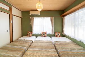 Una cama o camas en una habitación de 広尾駅徒歩2分 渋谷 六本木 表参道エリア 8宿泊可能 一棟貸切