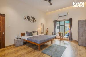 Imagen de la galería de Sundream Palms by VEO - Part of StayVista with Pool, Lawn, BBQ, en Alībāg 21 fotos más