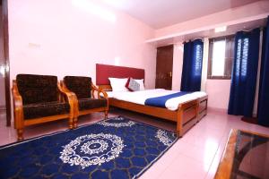 Postel nebo postele na pokoji v ubytování Janani Cottage + 9 fotografií