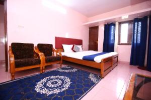 Postel nebo postele na pokoji v ubytování Janani Cottage