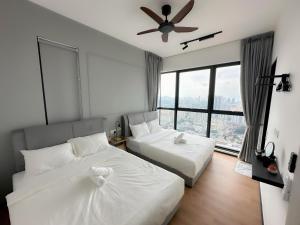 Postel nebo postele na pokoji v ubytování Cozy Urban Suites Georgetown View