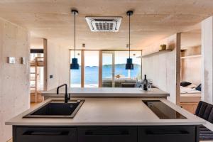 Gallery image of Luxury beachfront eco villa 77 with sauna in Drage