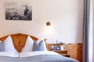 Postel nebo postele na pokoji v ubytování Gästehaus Pilz Schladming