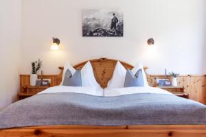 Postel nebo postele na pokoji v ubytování Gästehaus Pilz Schladming