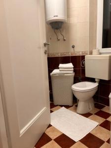 A bathroom at Cozy with parking