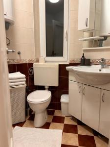 A bathroom at Cozy with parking