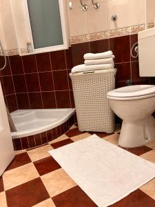 A bathroom at Cozy with parking