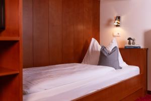 Postel nebo postele na pokoji v ubytování Gästehaus Pilz Schladming