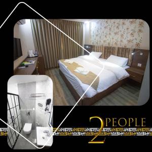 Postel nebo postele na pokoji v ubytování Beirut Hotel 2 New