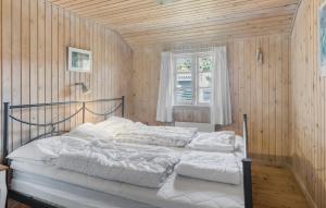 Katil atau katil-katil dalam bilik di 3 Bedroom Amazing Home In Rødby