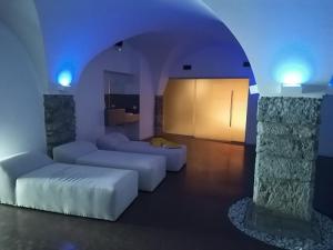 Postel nebo postele na pokoji v ubytování Grand Hotel Astoria