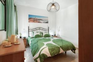 Postel nebo postele na pokoji v ubytování Casa Dajate, El Cotillo