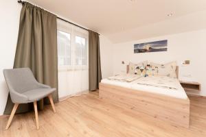 Posteľ alebo postele v izbe v ubytovaní Bergnest Oetztal Appartements Wenderkogel