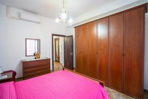 Ένα ή περισσότερα κρεβάτια σε δωμάτιο στο Peppe's home Tropea-Capo vaticano