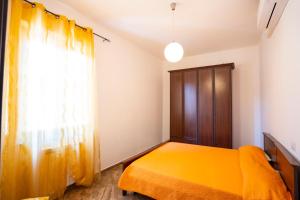 Ένα ή περισσότερα κρεβάτια σε δωμάτιο στο Peppe's home Tropea-Capo vaticano