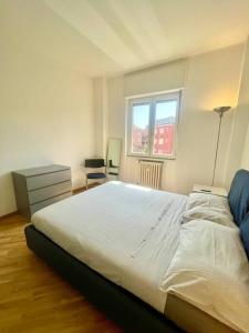 Postel nebo postele na pokoji v ubytování Appartamento Tolstoj