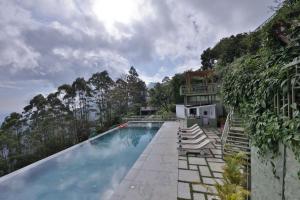 Bassein majutusasutuses Fragrant Nature Munnar - A Five Star Classified Hotel või selle lähedal