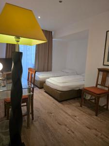 Ein Bett oder Betten in einem Zimmer der Unterkunft Hotel Stern