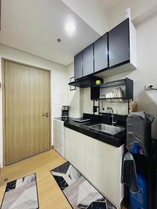 Billede fra billedgalleriet på Jasrich Suite Behind SM trece martires HOPE RESIDENCES SMDC i Cavite