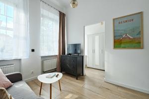 Μια τηλεόραση ή/και κέντρο ψυχαγωγίας στο CityCenterApartments/M32/2A
