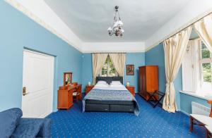 Postel nebo postele na pokoji v ubytování Palmse Manor Guesthouse + 14 fotografií