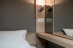 A bed or beds in a room at Taipei Discover Hostel