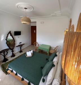 TV o dispositivi per l'intrattenimento presso Hotel Meftah Chaouen