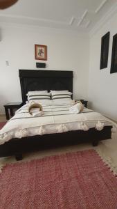 Letto o letti in una camera di Hotel Meftah Chaouen