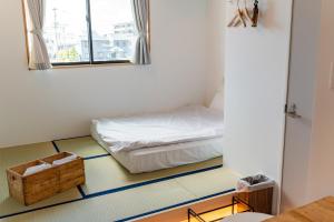 Postel nebo postele na pokoji v ubytování HOTEL fah