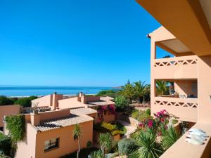 a view of the houses from the balcony of a resort at Apartamentos Turísticos Buganvilia in Lagos +92 photos