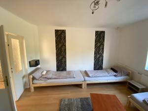 Postel nebo postele na pokoji v ubytování LaVendel Vendégház Sajópálfala