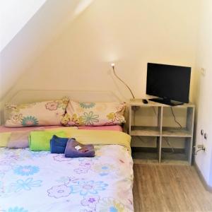 Postel nebo postele na pokoji v ubytování Ins Fischernetz