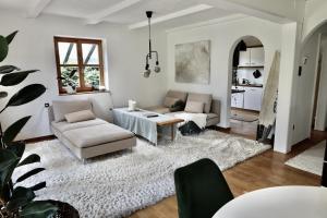 Posezení v ubytování Ferienhaus Flying Roots Wackersberg