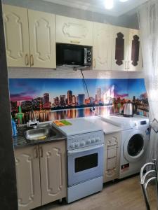 Dapur atau dapur kecil di Квартира люкс