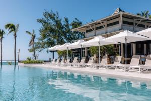 Бассейн в Cotton Bay Resort & Spa или поблизости