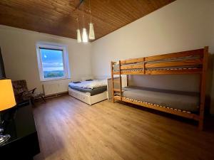 Ένα ή περισσότερα κρεβάτια σε δωμάτιο στο Wupa Flats